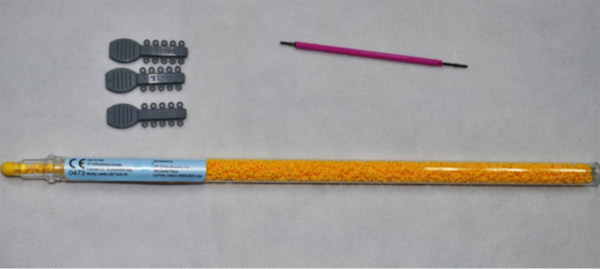 Fig. 1 Módulos elastoméricos Ormco (color gris), Morelli (color rosado), Tp Orthodontic (color amarillo)