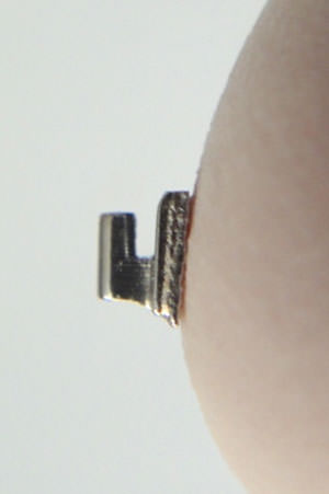 Figure 1 The original Begg Bracket, with a single slot facing gingivally.